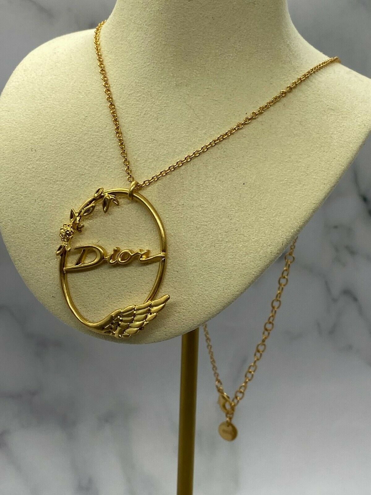CHRISTIAN DIOR Gold Tone Wing Charm Necklace - Pre owned