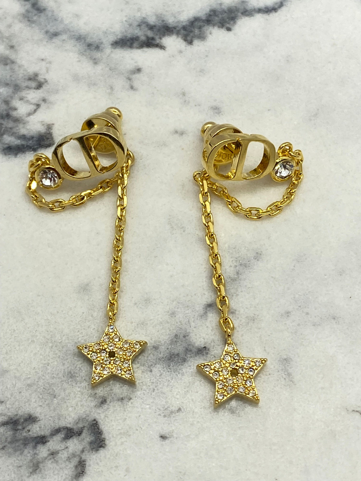 CHRISTIAN DIOR CD Gold Tone Star Pendant Earrings - Pre owned