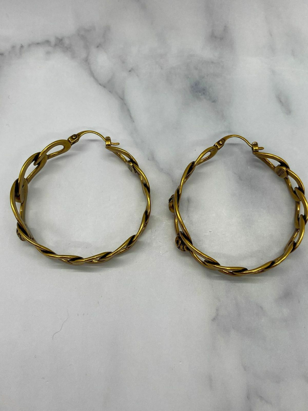 ALEXANDER MCQUEEN Brass Tone Skull Hoop Earrings - Pre owned