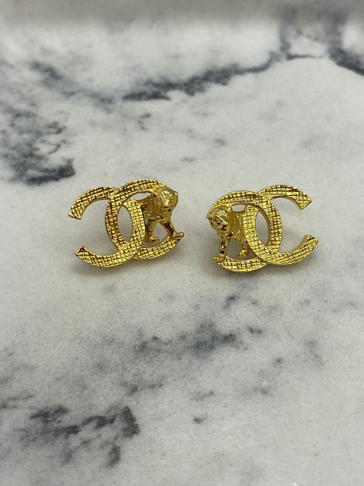 CHANEL CC Gold Tone Lion Earrings - Pre owned