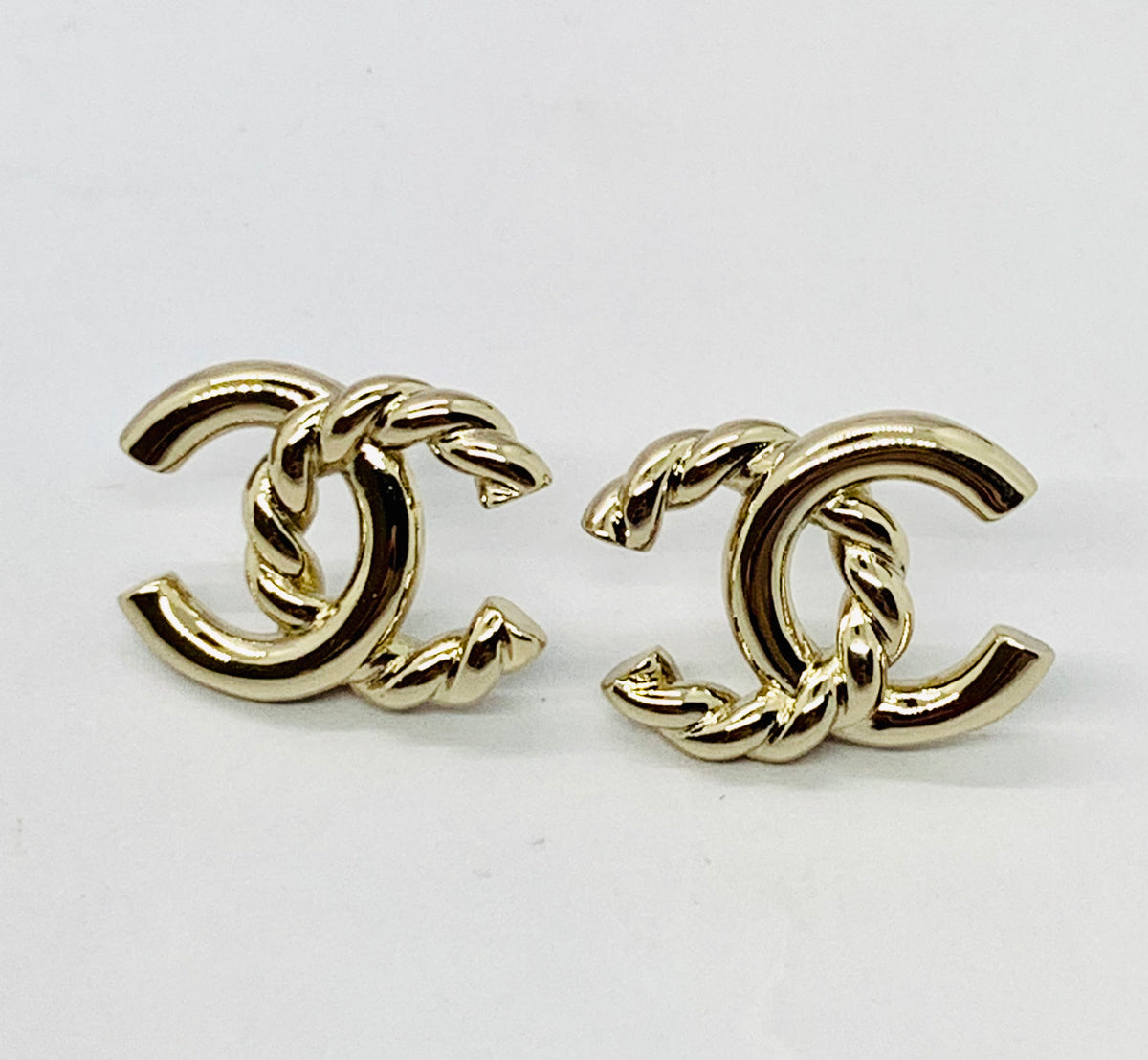 CHANEL CC Gold Tone Twist Earrings - Pre owned