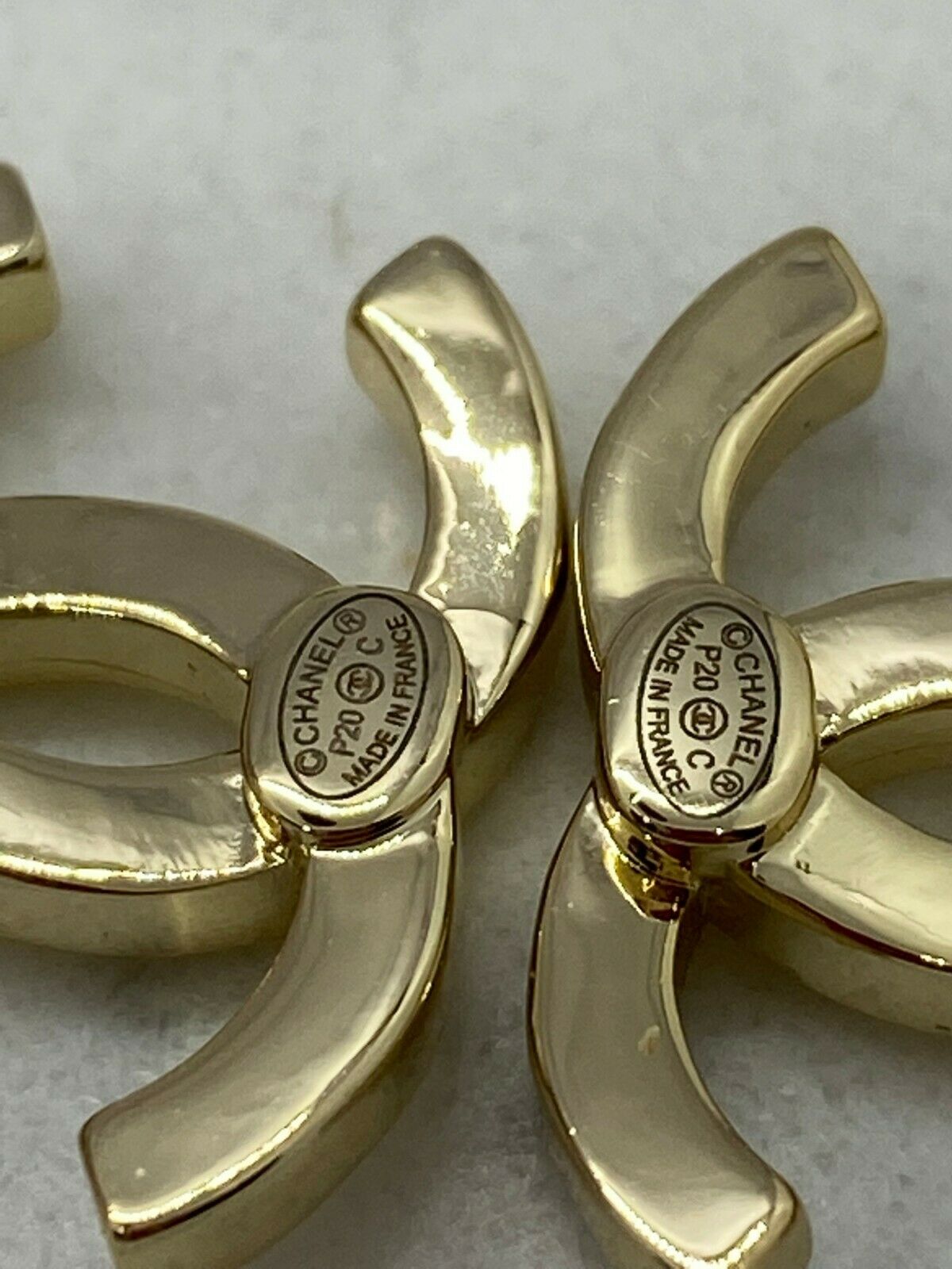 CHANEL CC Gold Tone Charm Pendant Earrings - Pre owned