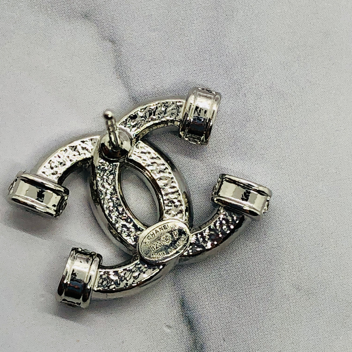 CHANEL CC Silver Tone Rhinestone Earrings - Pre owned