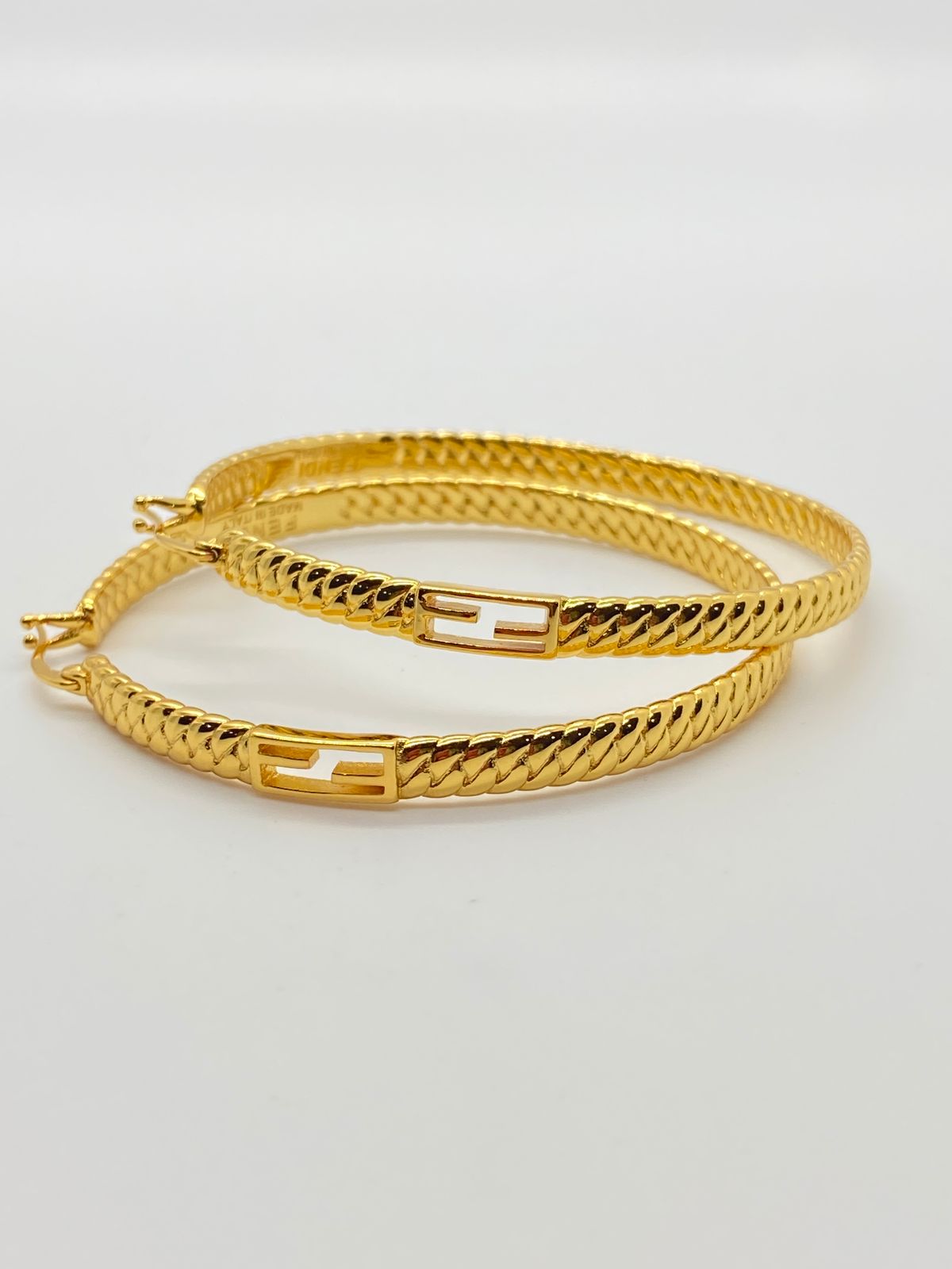 FENDI F Gold Tone Textured Large Hoop Earrings - Pre owned