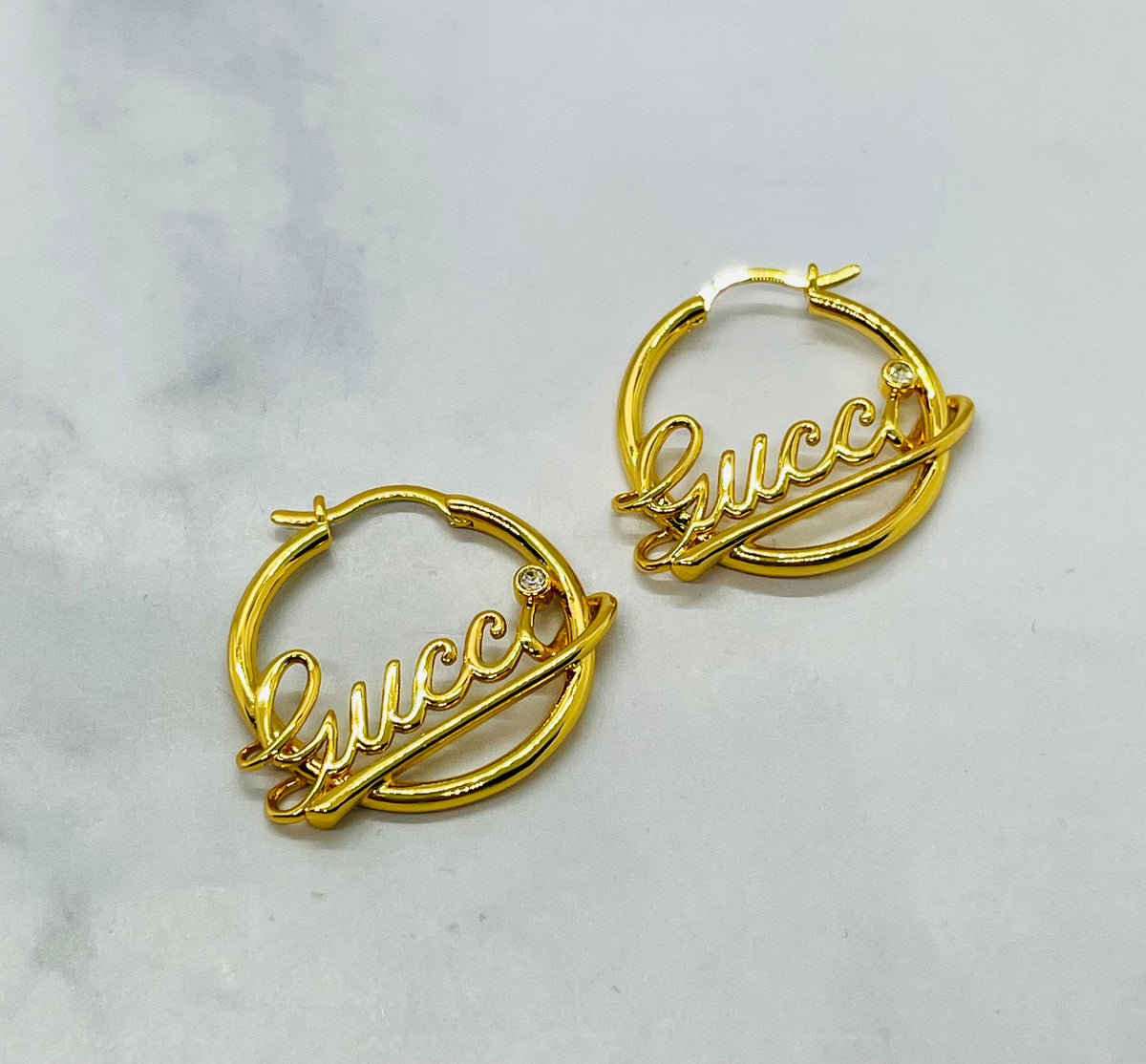 GUCCI Script Gold Tone Hoop Earrings - Pre owned