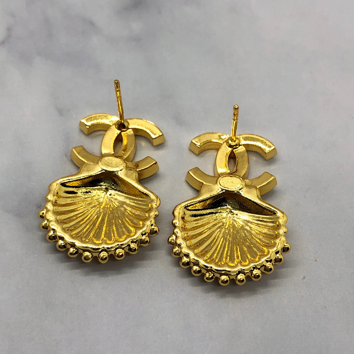 CHANEL CC Gold Tone Rhinestone Shell Earrings - Pre owned