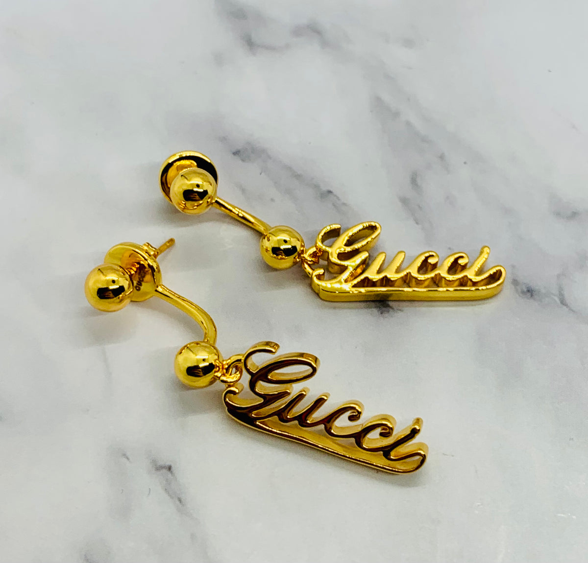 GUCCI Signature Gold Tone Pendant Earrings - Pre owned