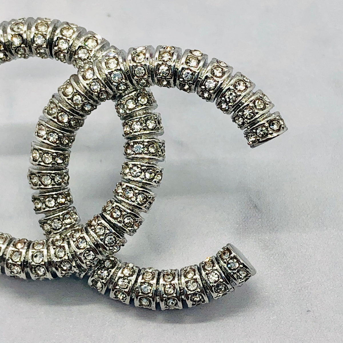CHANEL CC Silver Tone Rhinestone Earrings - USED