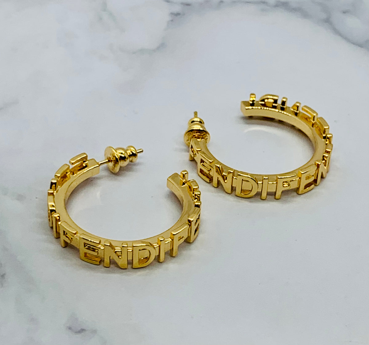 FENDI Monogram Gold Tone Hoop Earrings - Pre owned