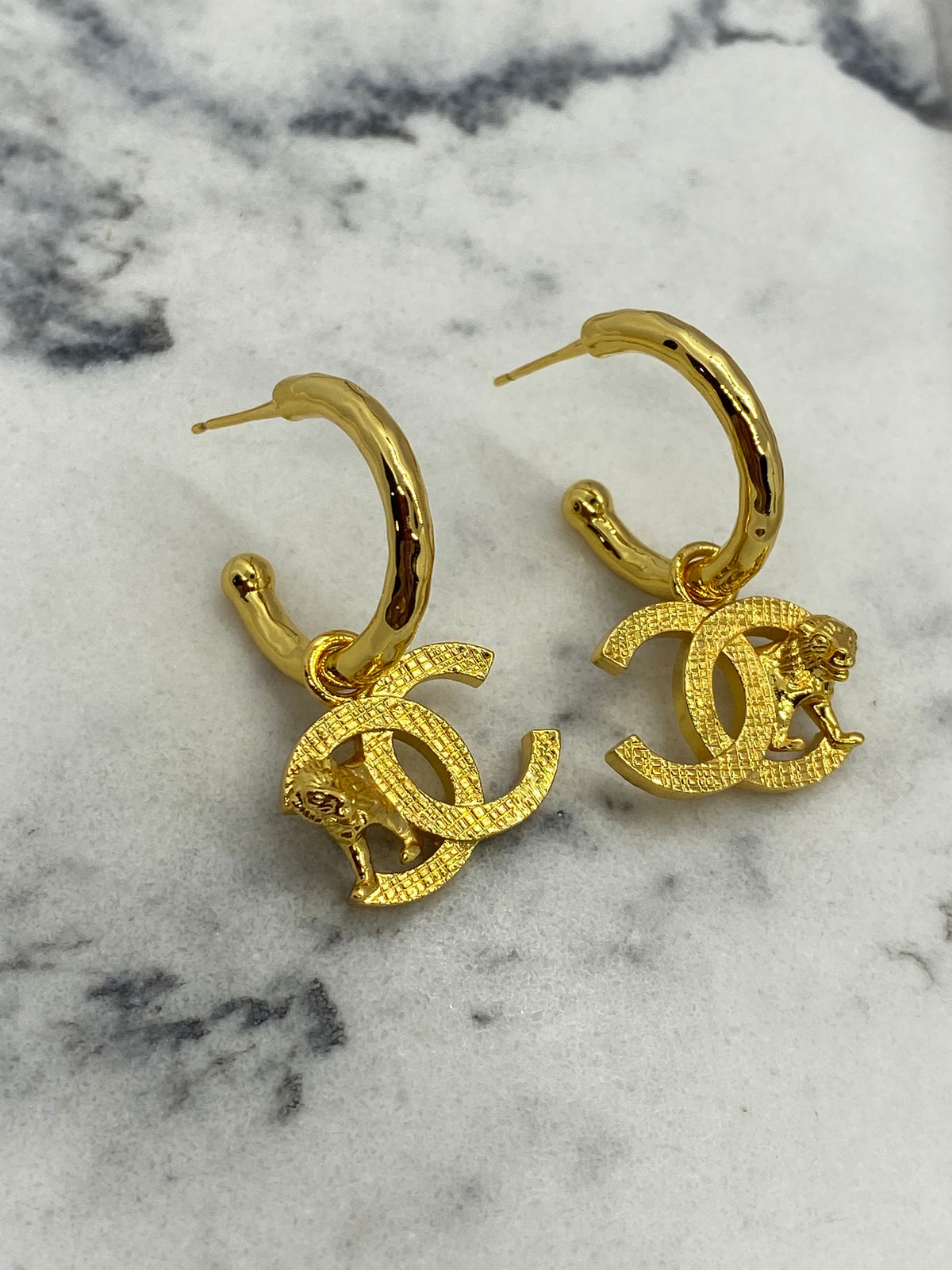 CHANEL CC Gold Tone Lion Earrings - Pre owned