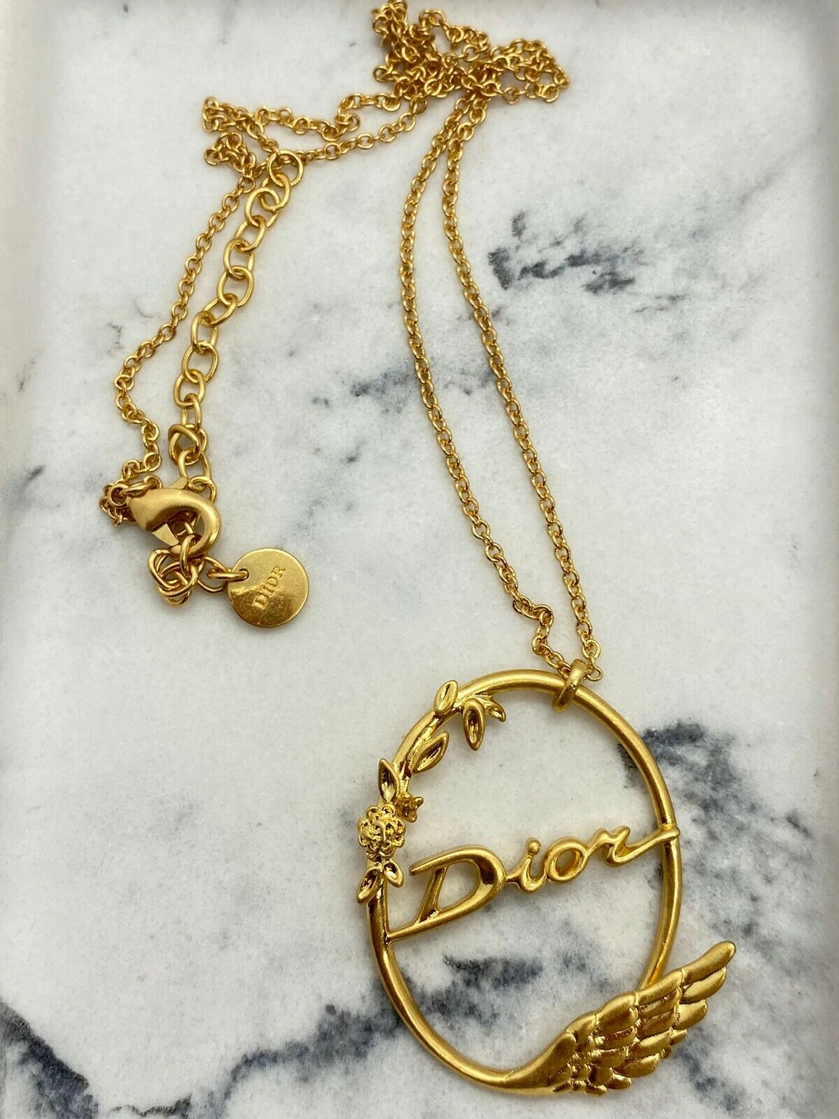 CHRISTIAN DIOR Gold Tone Wing Charm Necklace - Pre owned