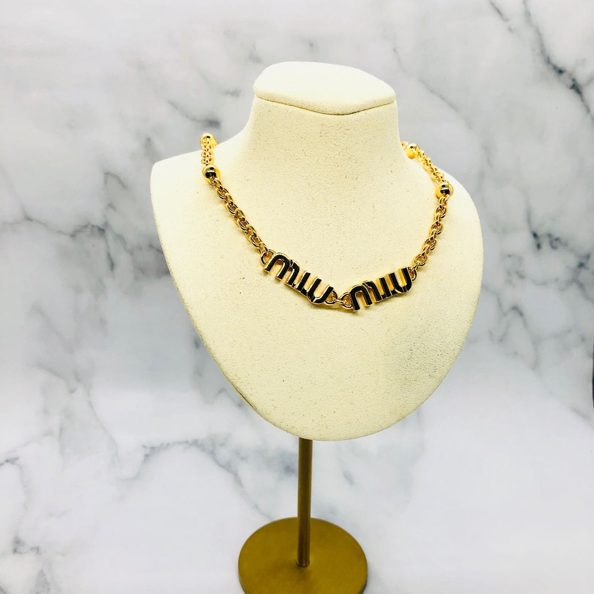 MIU MIU Gold Tone Monogram Necklace - Pre owned