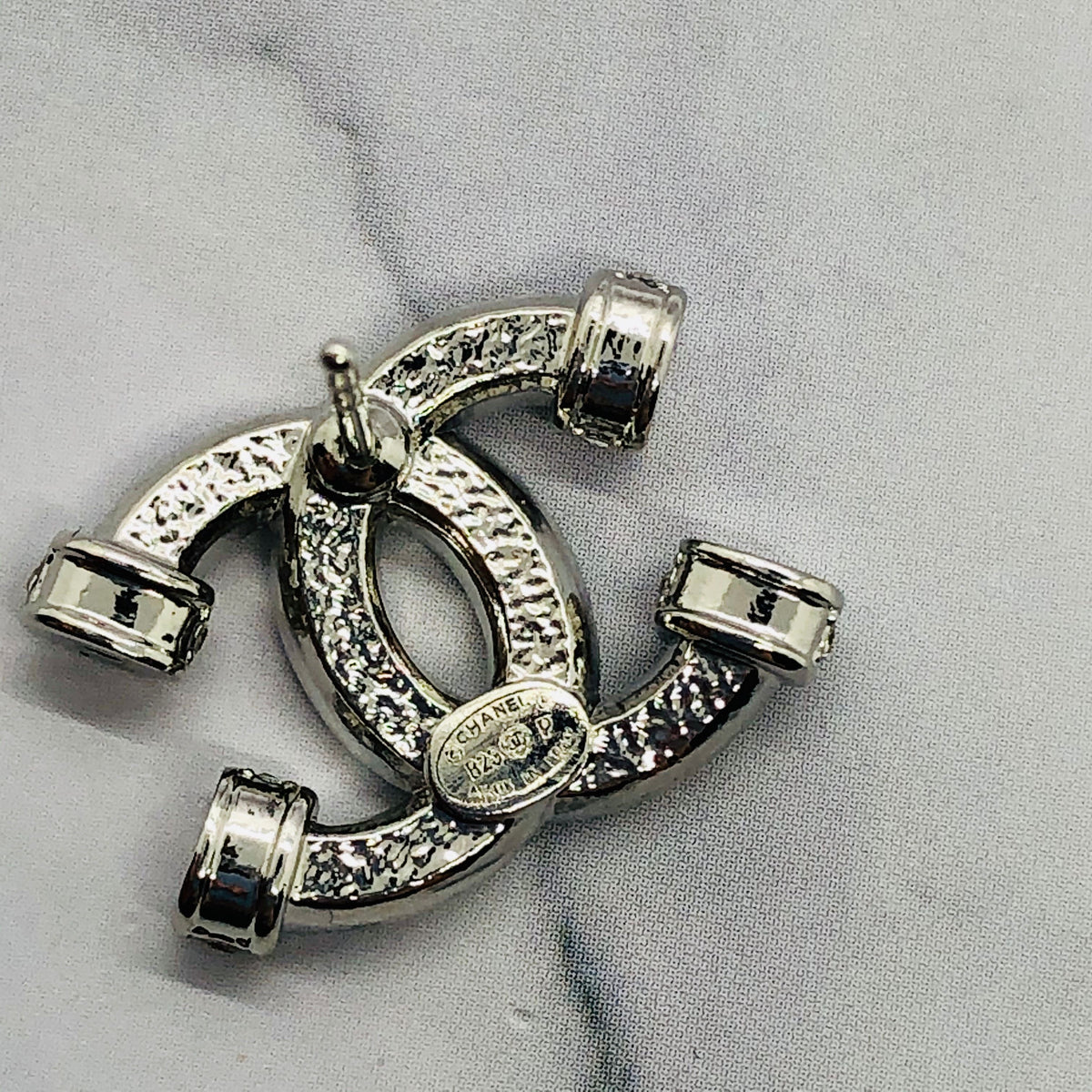 CHANEL CC Silver Tone Rhinestone Earrings - Pre owned