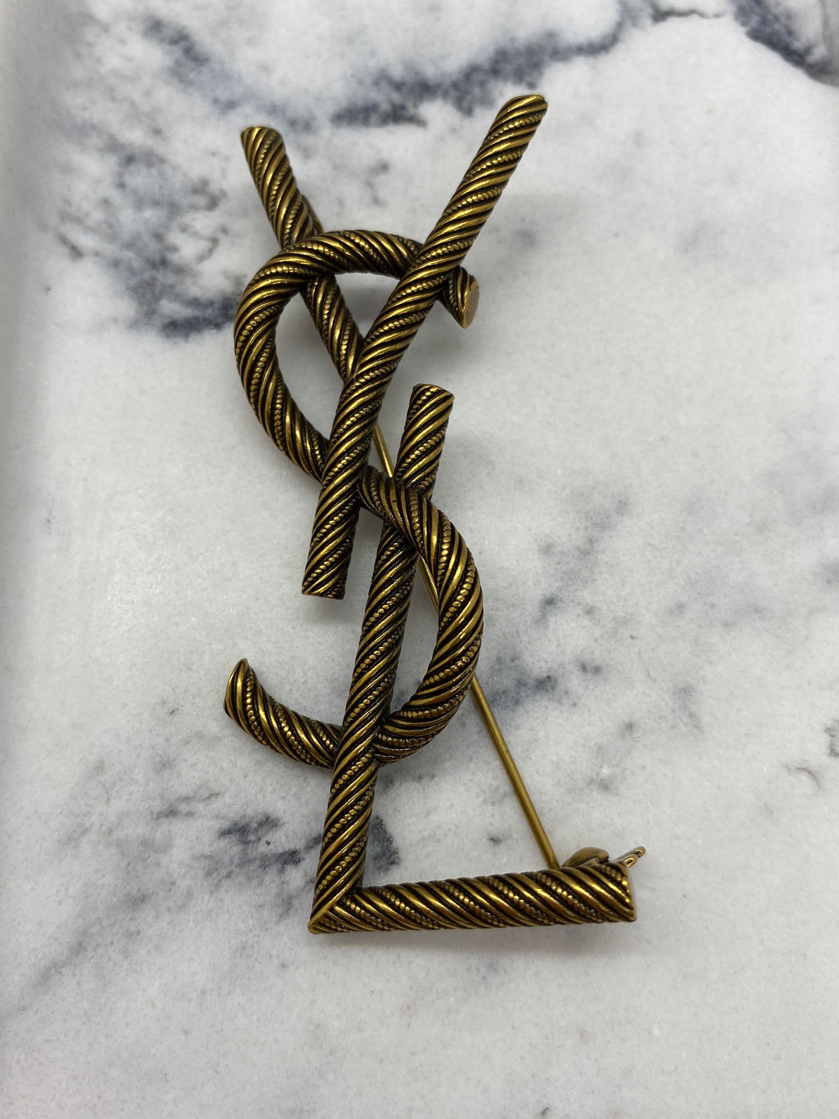 YSL Saint Laurent Brass Tone Monogram Brooch Pin - Pre owned