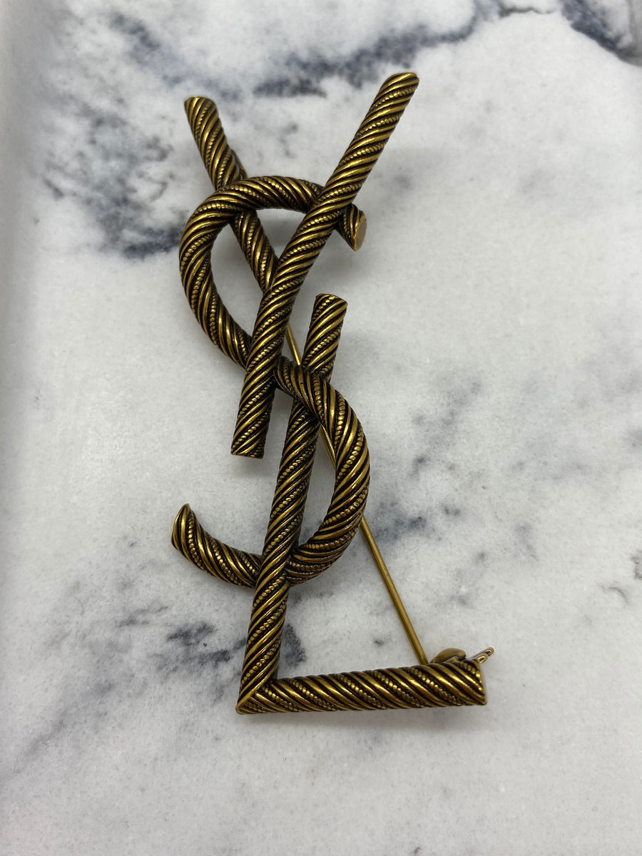 YSL Saint Laurent Brass Tone Monogram Brooch Pin - Pre owned