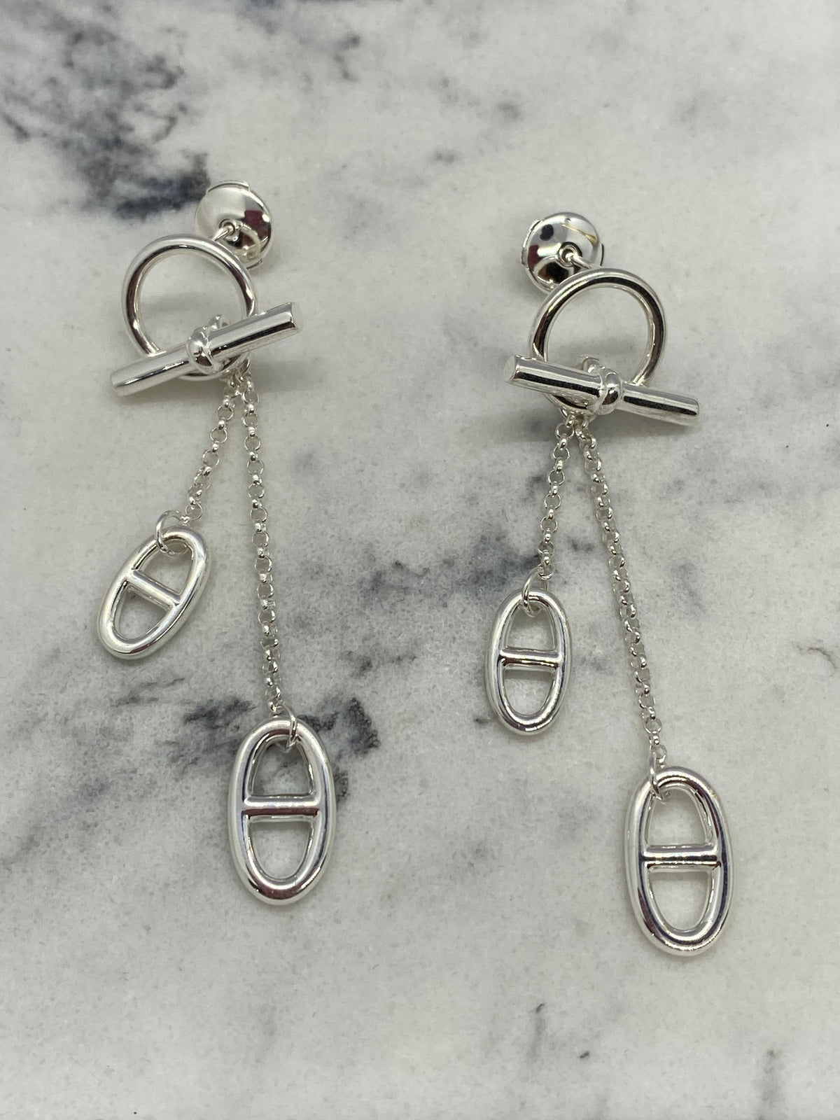 HERMES Silver Tone Monogram Pendant Earrings - Pre owned