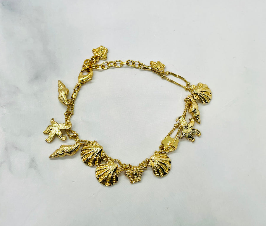 VERSACE Shells Charms Cruise Gold Tone Bracelet - Pre owned