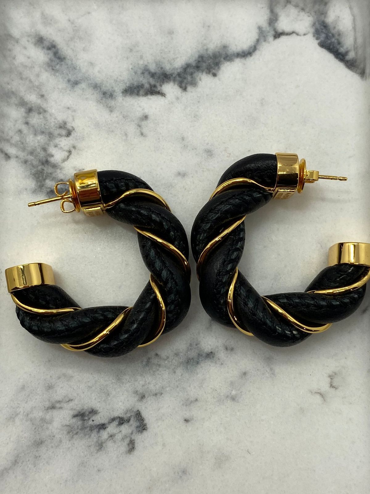 BOTTEGA VENETA Black Leather Gold Tone Twist Earrings - Pre owned