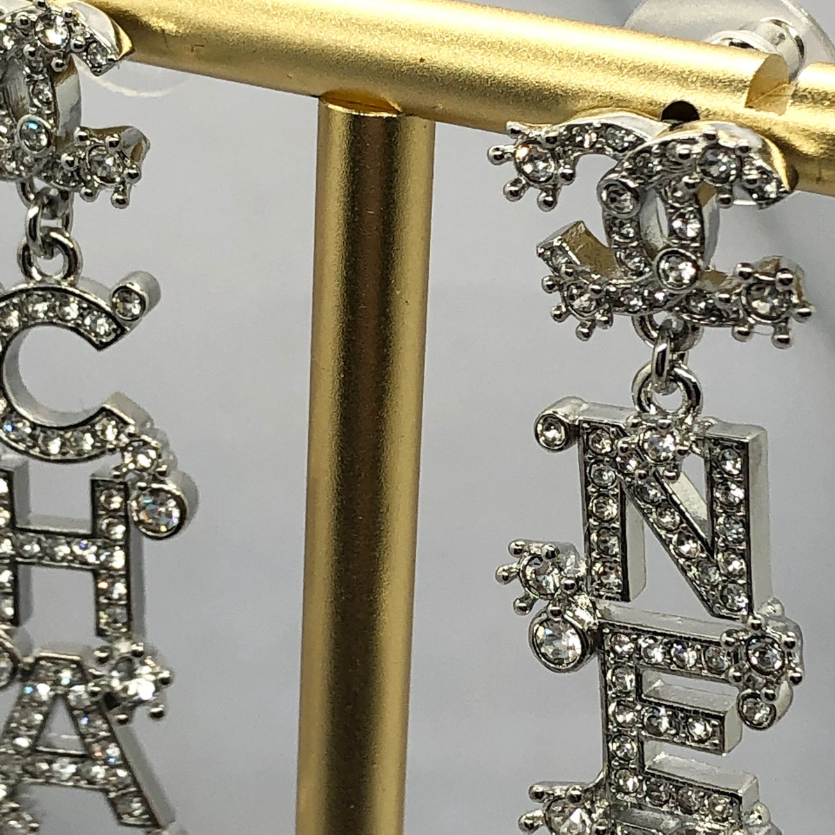CHANEL CC Silver Tone Rhinestone Pendant Earrings - Pre owned