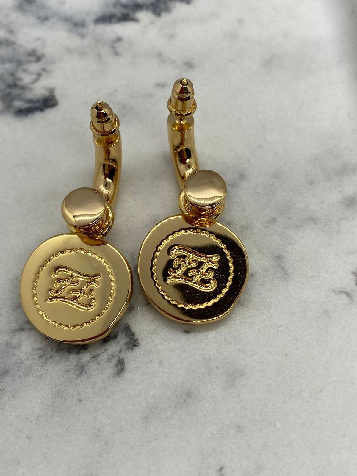 FENDI Gold Tone Monogram Earrings - Pre owned
