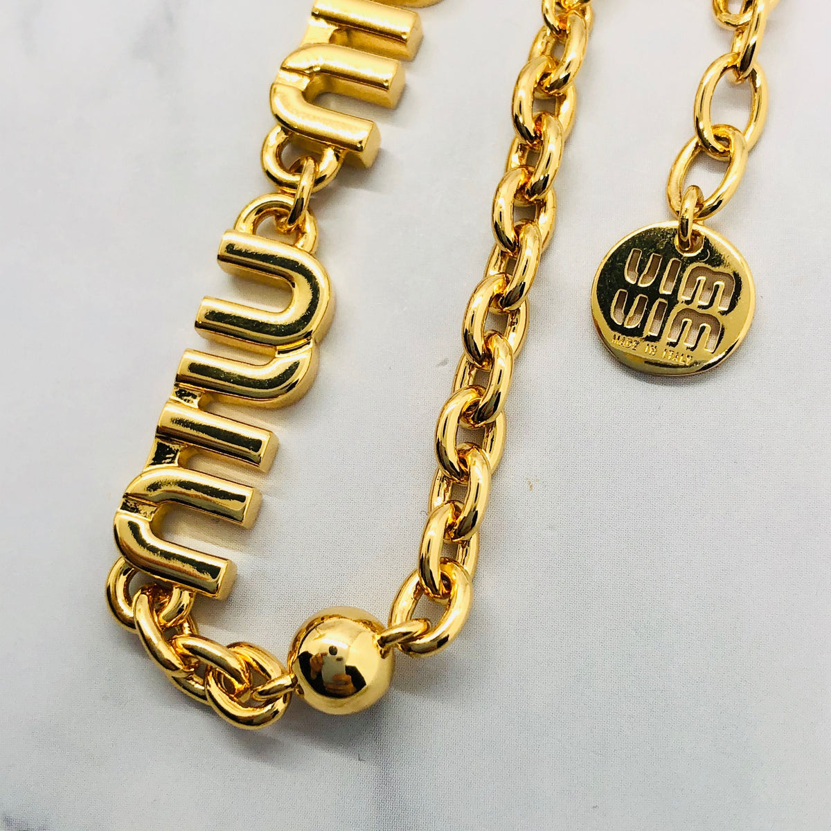 MIU MIU Gold Tone Monogram Bracelet - Pre owned