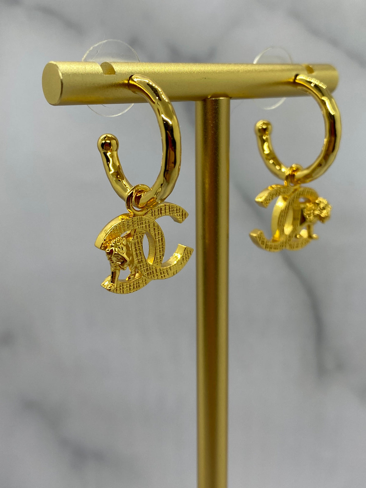 CHANEL CC Gold Tone Lion Earrings - Pre owned