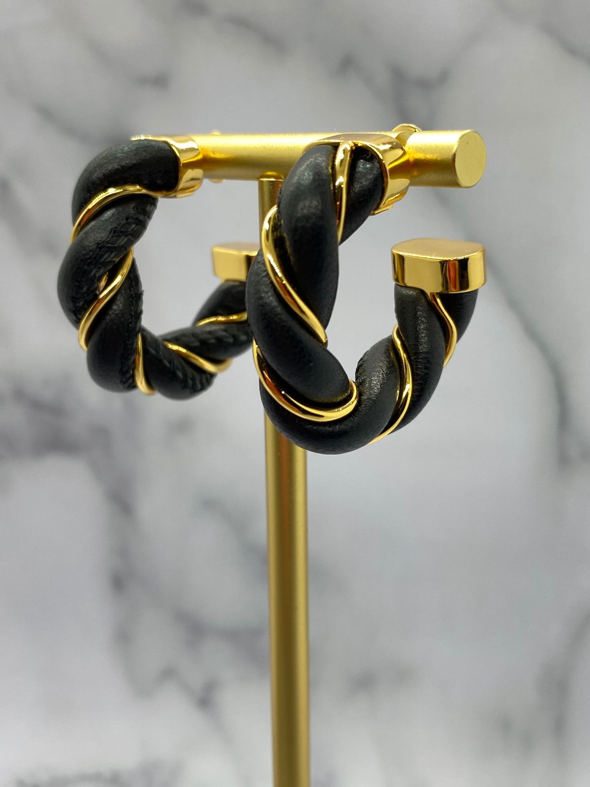 BOTTEGA VENETA Black Leather Gold Tone Twist Earrings - Pre owned