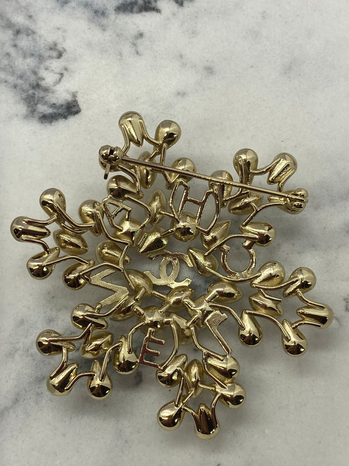 CHANEL CC Rhinestone Snowflake Brooch Pin - Pre owned