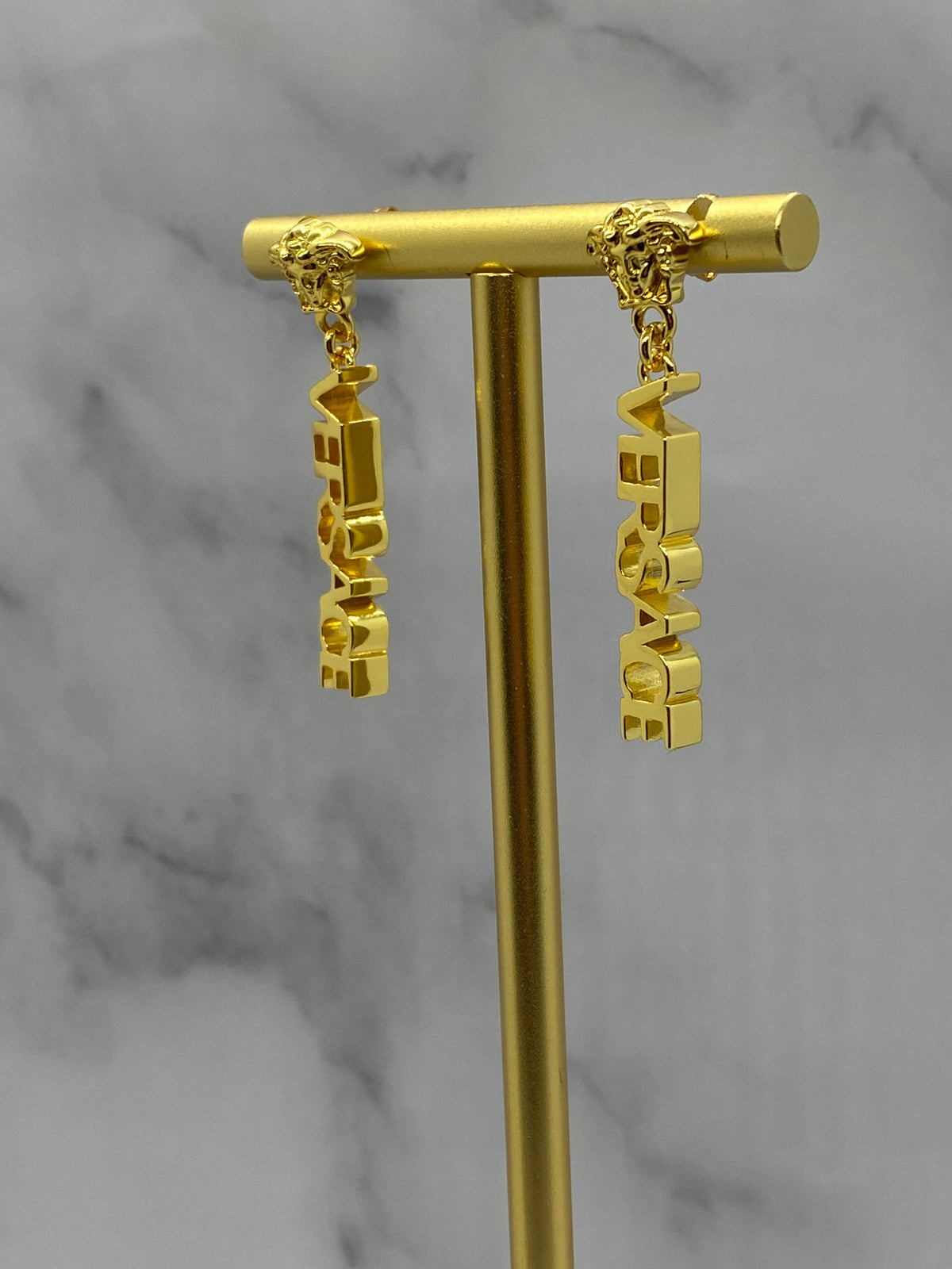 VERSACE Gold Tone Monogram Pendant Earrings - Pre owned