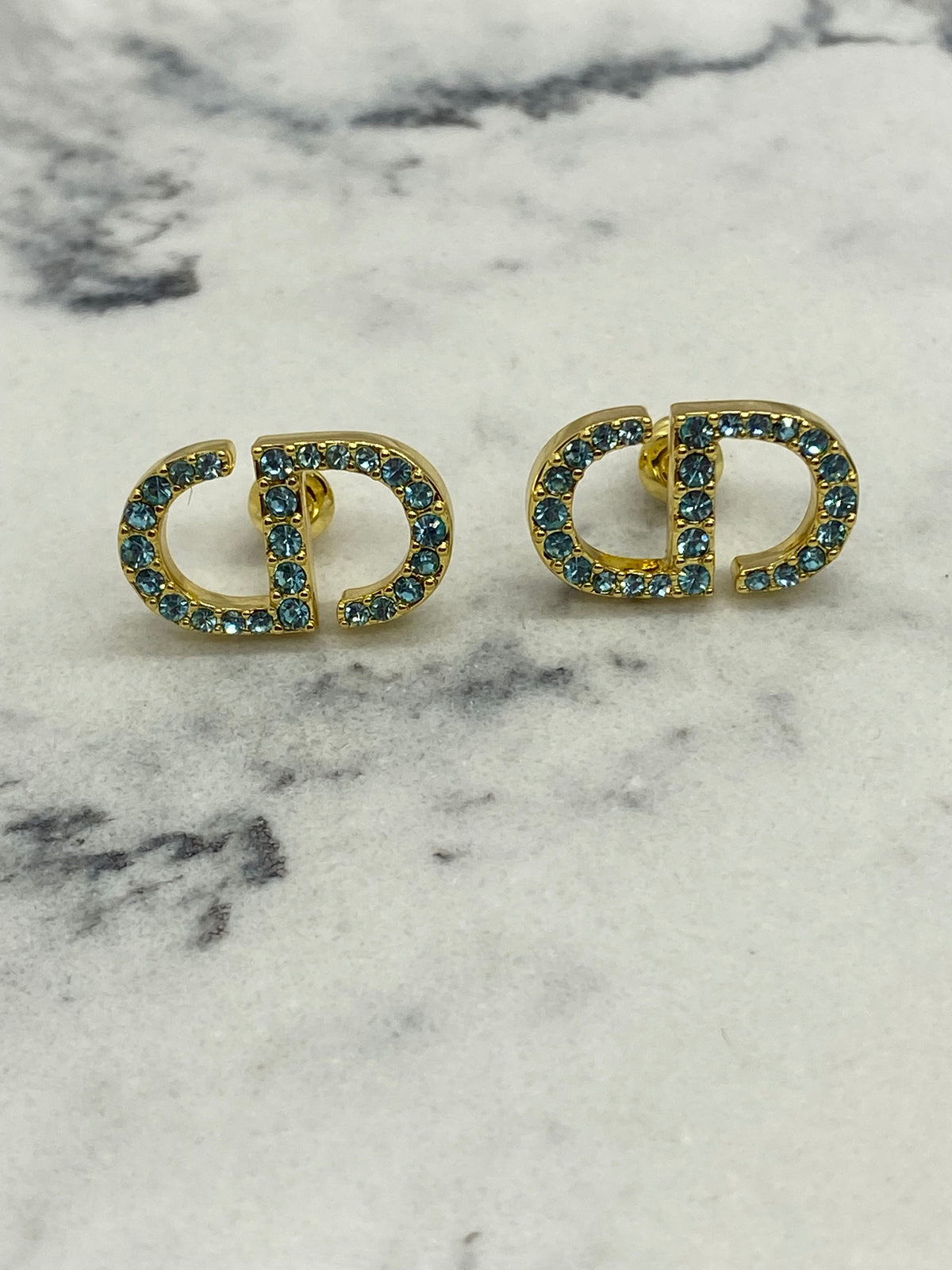 CHRISTIAN DIOR CD Gold Tone Blue Rhinestone Earrings - Pre owned