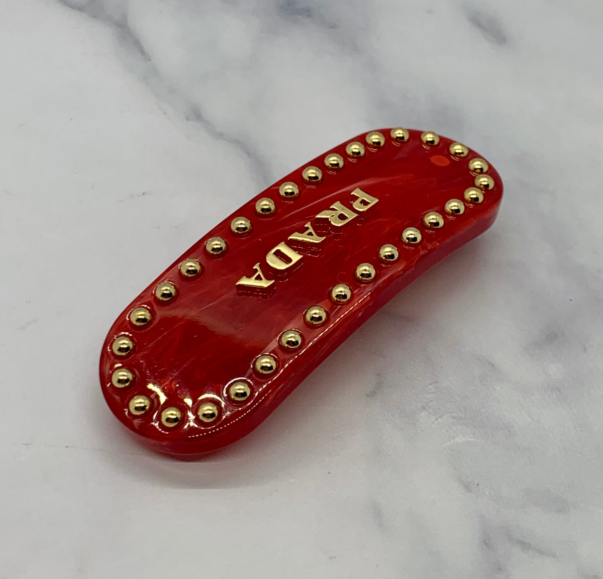 PRADA Red Acrylic Gold Stud Hair Clip Barrette - Pre owned