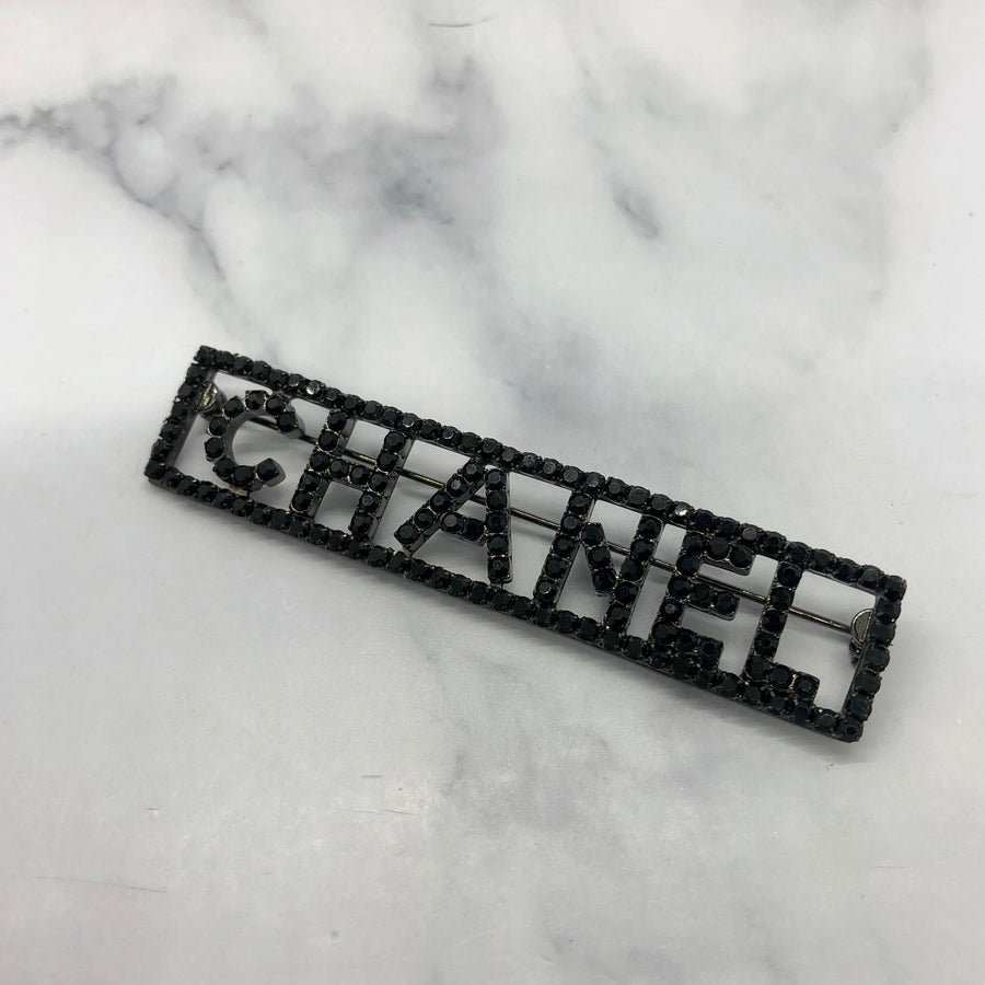 CHANEL Black Rhinestone Name Plate Brooch Pin - Pre owned