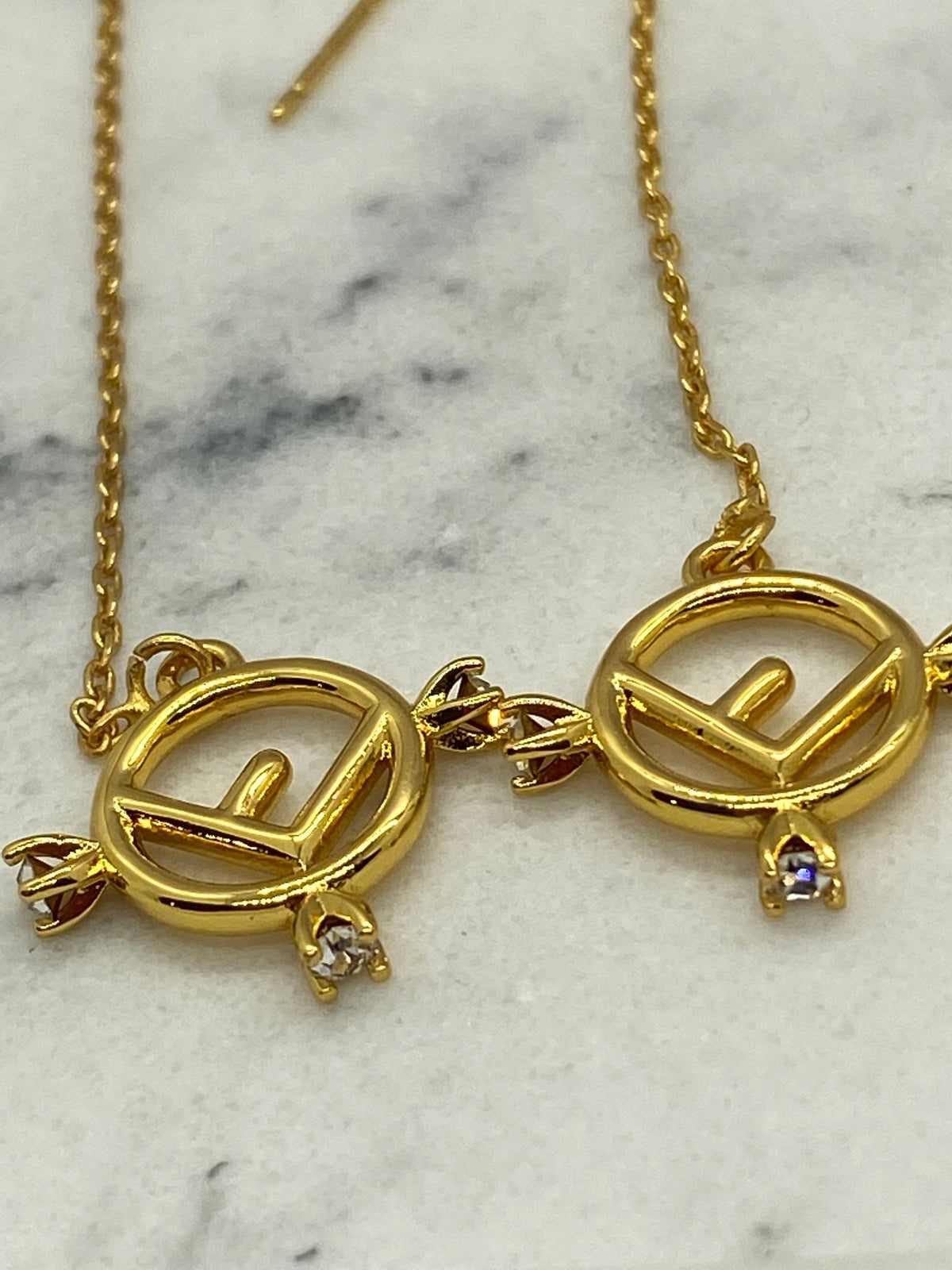 FENDI F Gold Tone Threaded Rhinestone Earrings - Pre owned