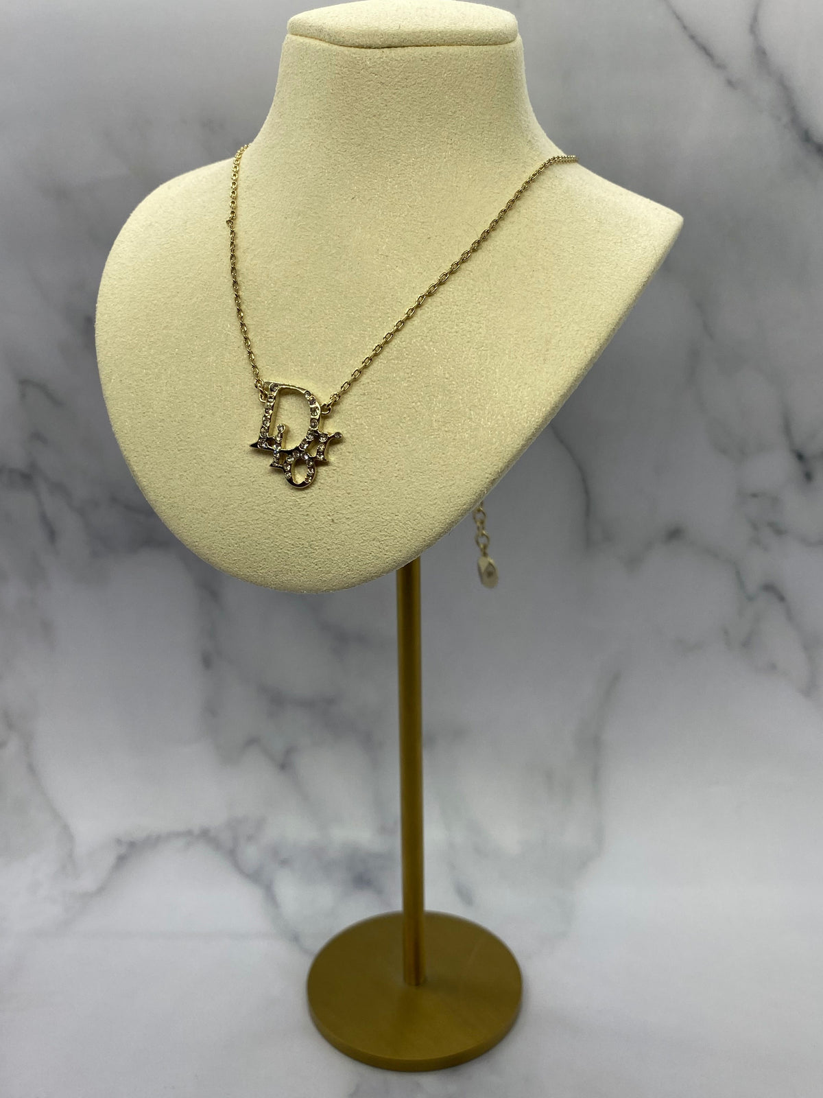 CHRISTIAN DIOR Silver Tone Rhinestone Monogram Necklace- Pre owned