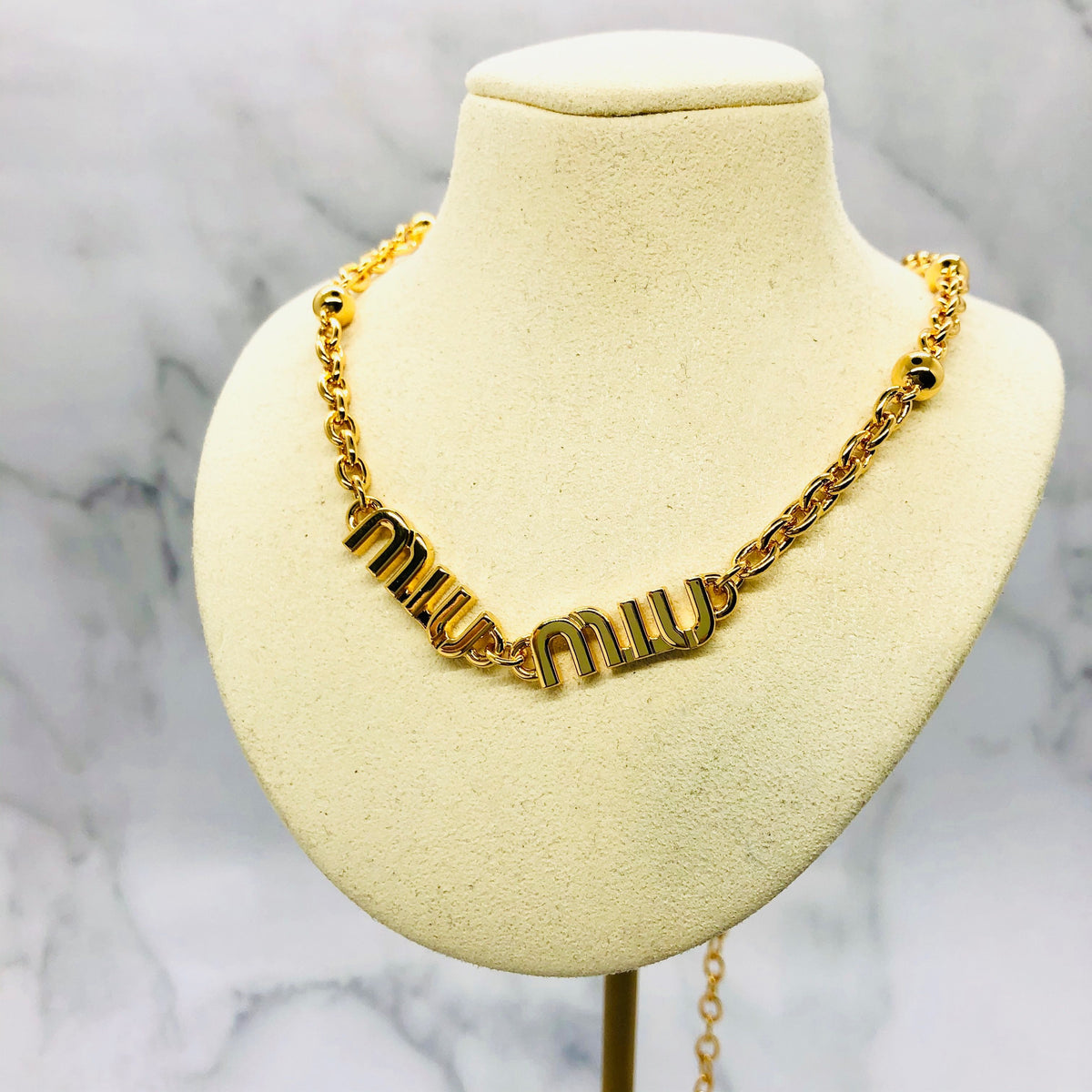 MIU MIU Gold Tone Monogram Necklace - Pre owned