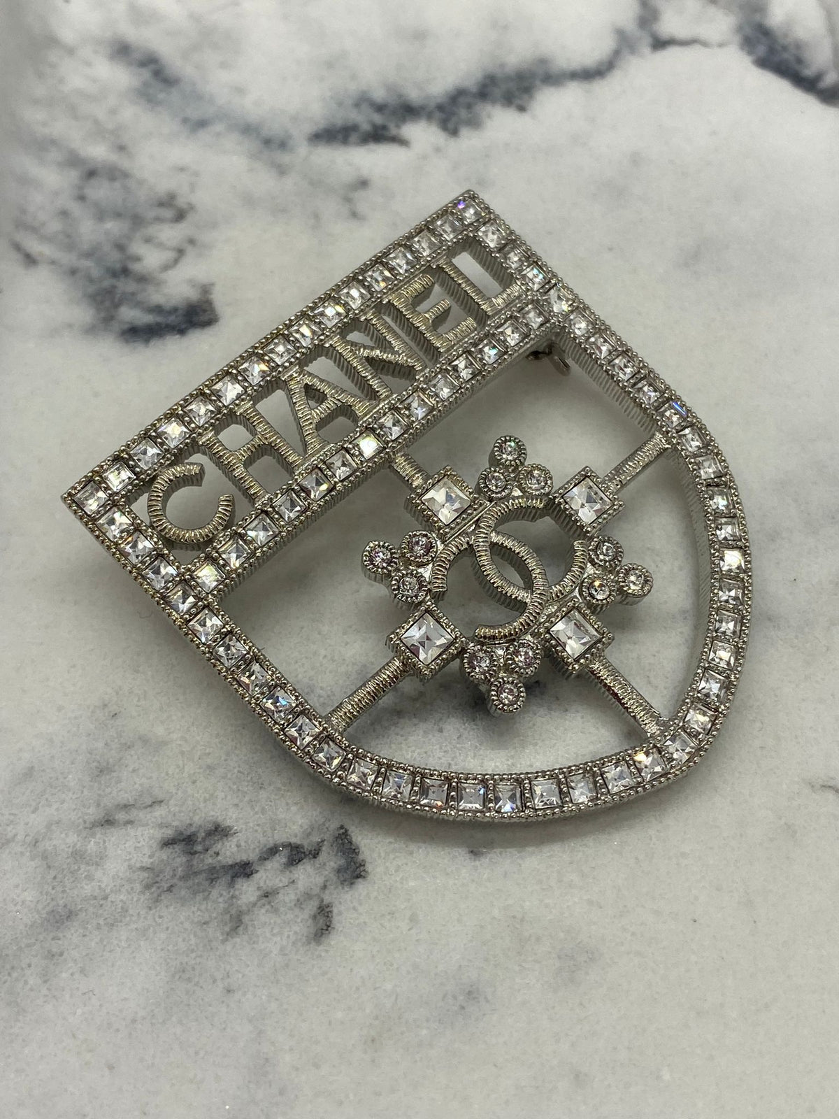 CHANEL CC Silver Tone Rhinestone Shield Brooch - Pre owned