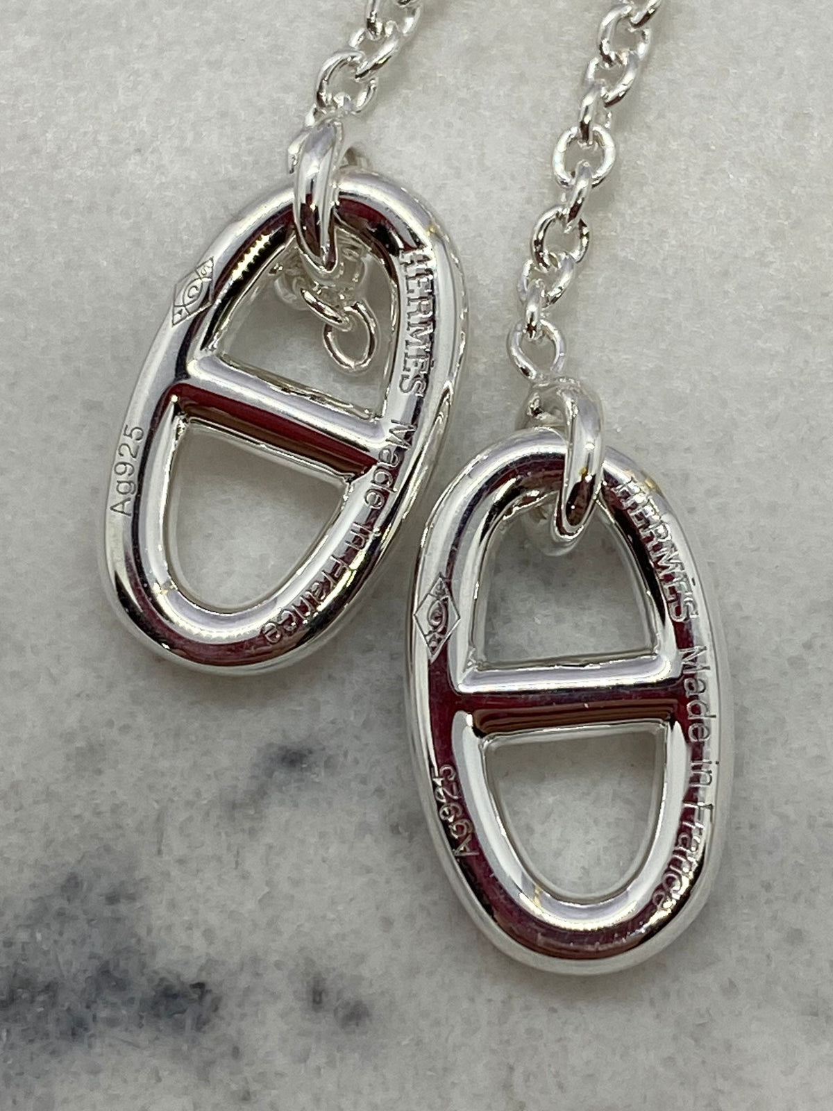 HERMES Silver Tone Pendant Earrings - Pre owned