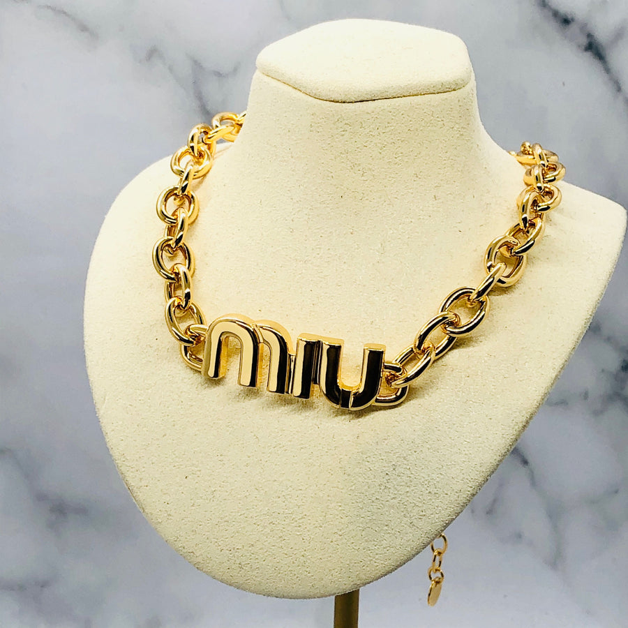 MIU MIU Gold Tone Monogram Necklace - Pre owned