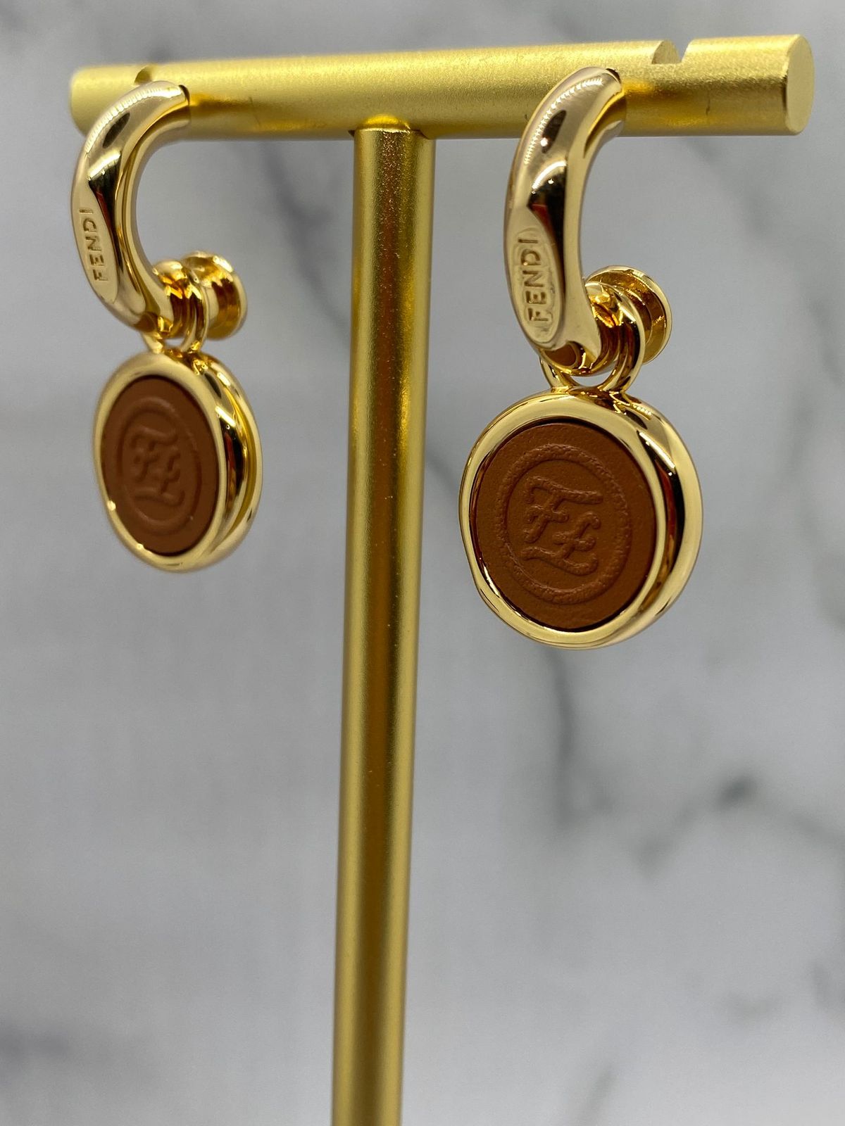 FENDI Gold Tone Monogram Earrings - Pre owned