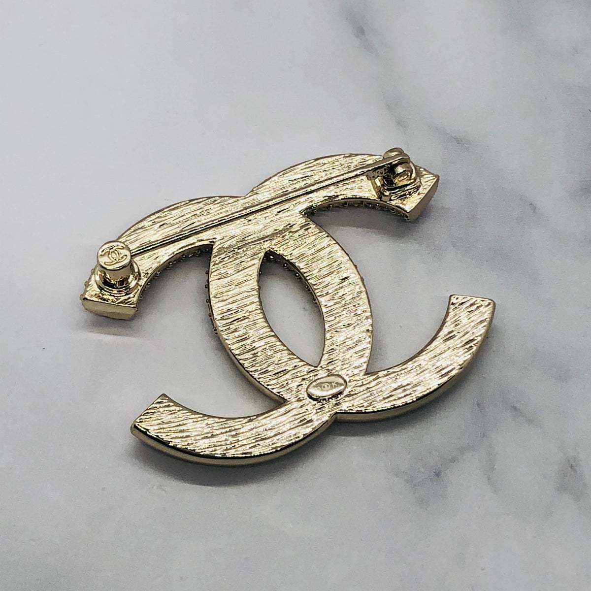 CHANEL CC Half Rhinestone Gold Tone Earrings - Pre owned