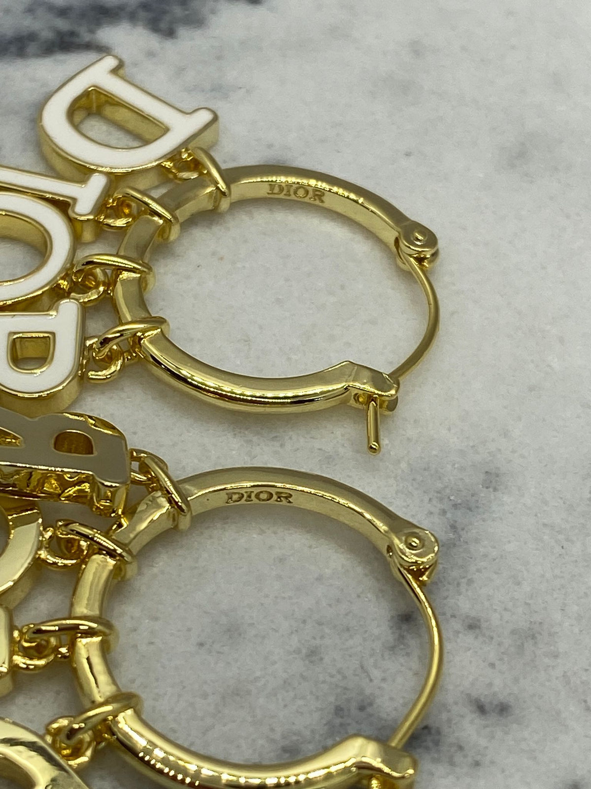 CHRISTIAN DIOR Gold Tone Charm Hoop Earrings - Pre owned