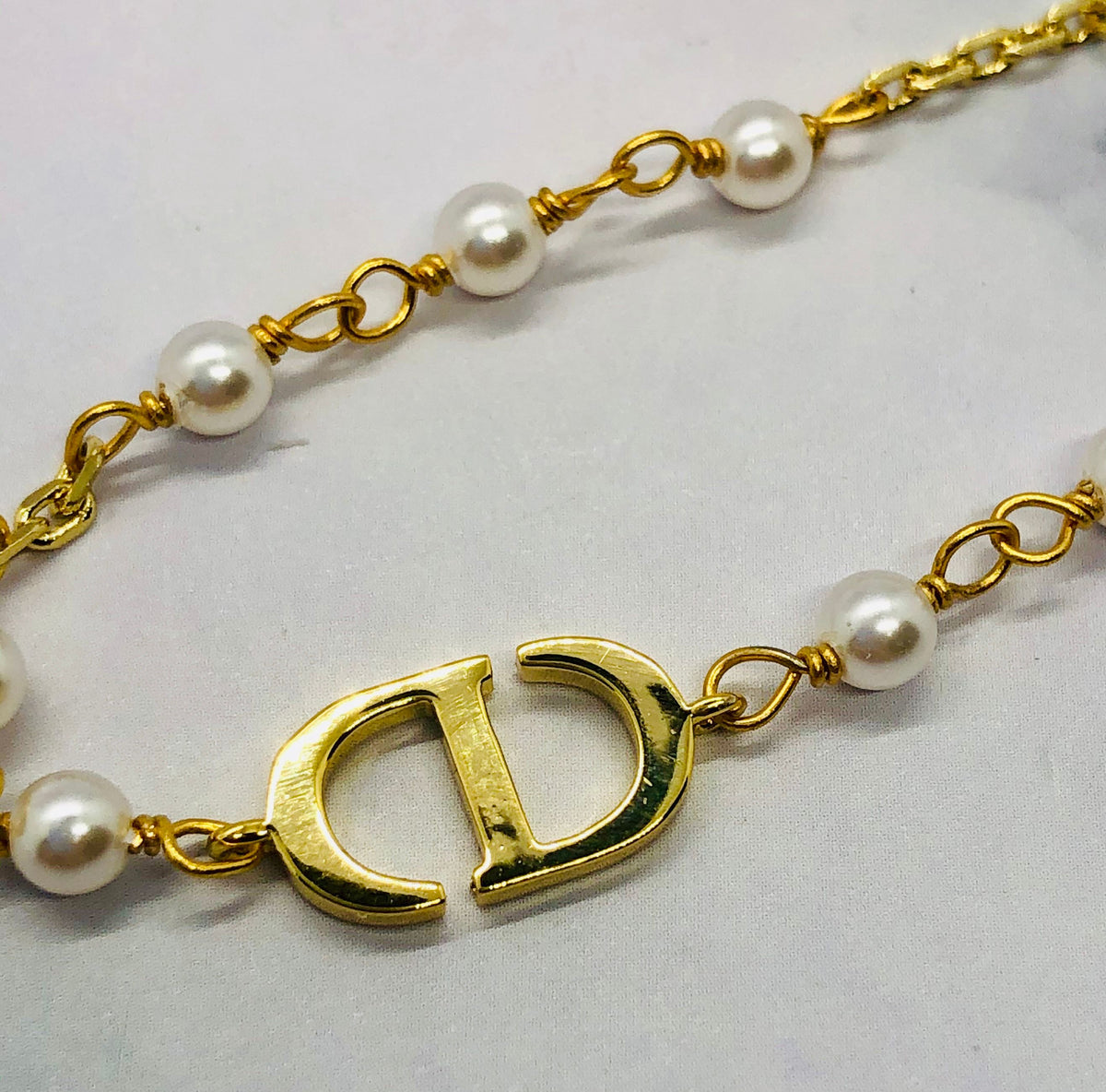 CHRISTIAN DIOR CD Pearl Trim Gold Bracelet - Pre owned