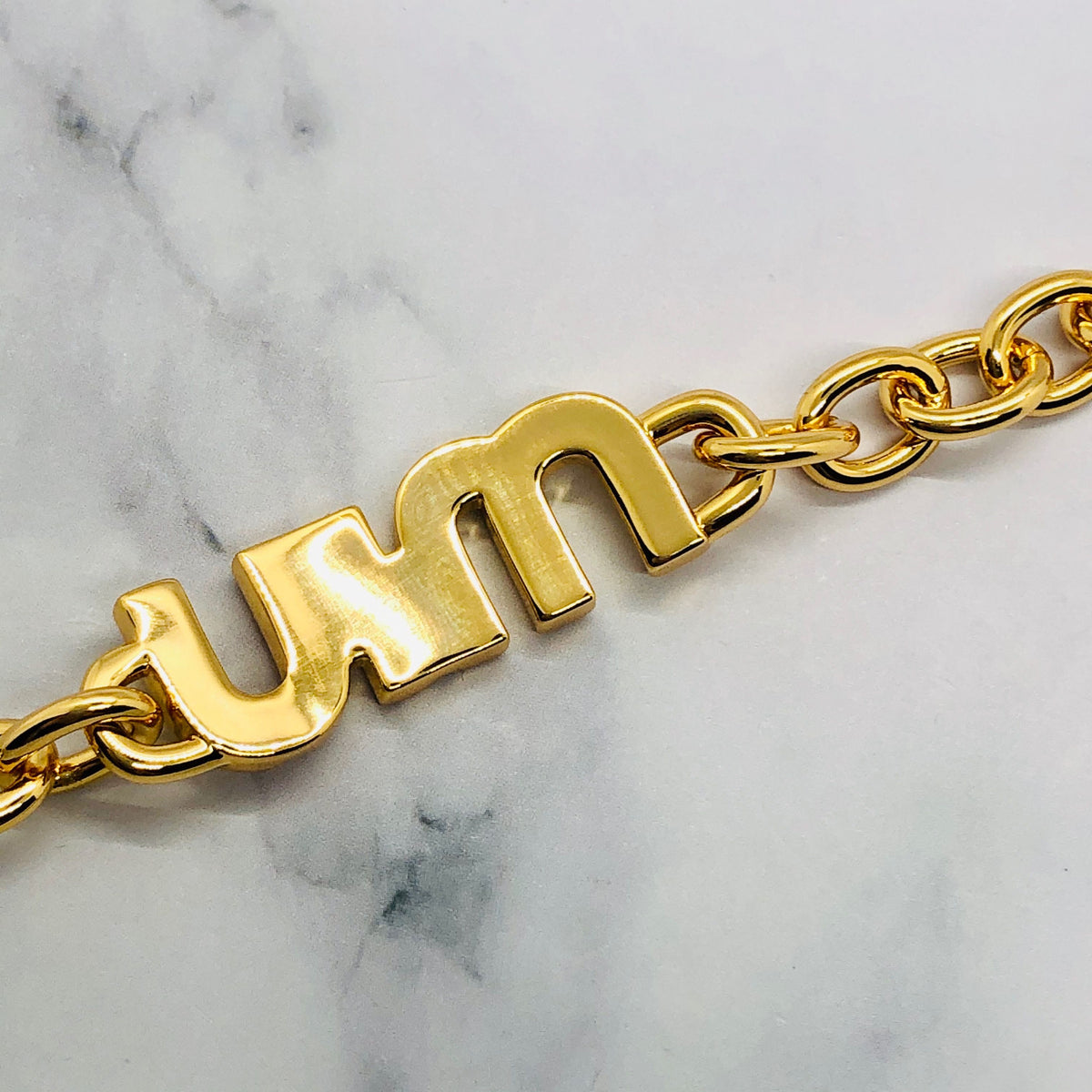 MIU MIU Gold Tone Monogram Bracelet - Pre owned