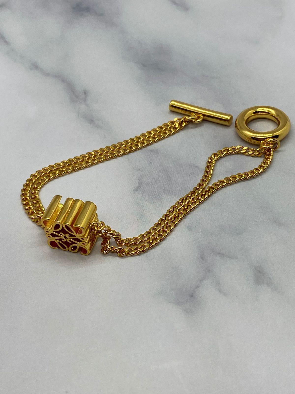 LOEWE Gold Tone Charm Chain Bracelet - USED
