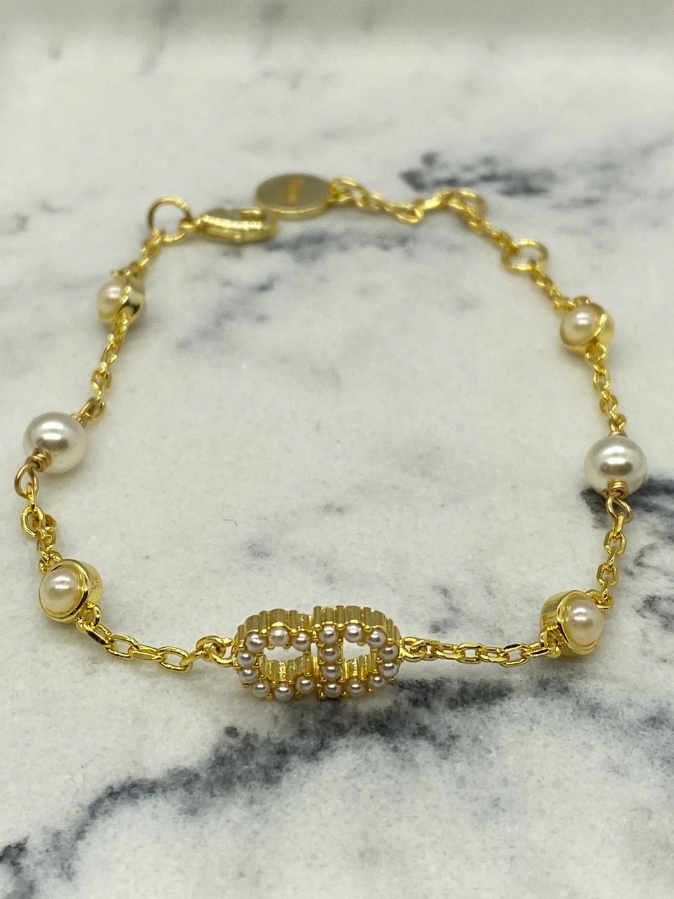 CHRISTIAN DIOR CD Rhinestone Trim Gold Tone Bracelet - Pre owned