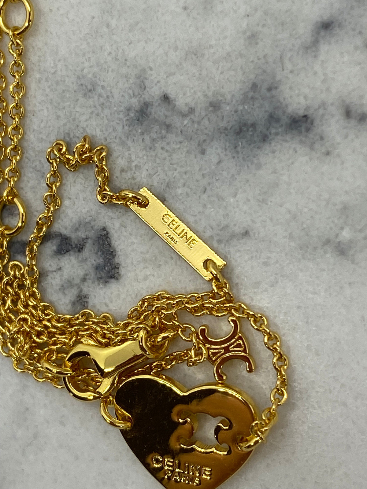CELINE Gold Tone Heart Monogram Charm Bracelet - Pre owned