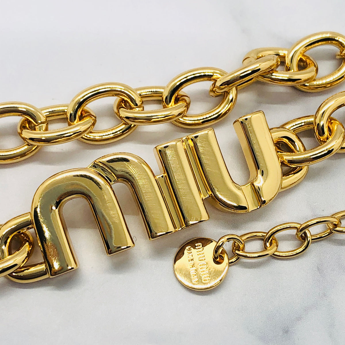 MIU MIU Gold Tone Monogram Bracelet - Pre owned