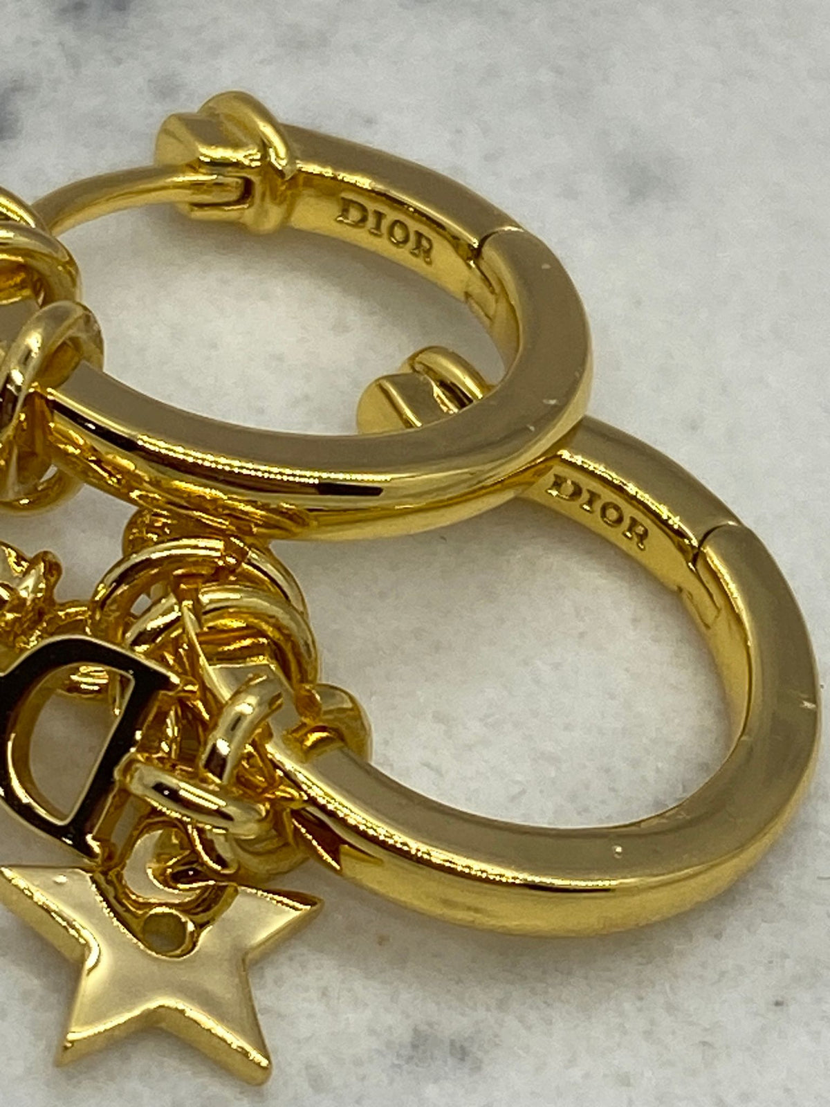 CHRISTIAN DIOR Gold Tone Charm Hoop Earrings - Pre owned