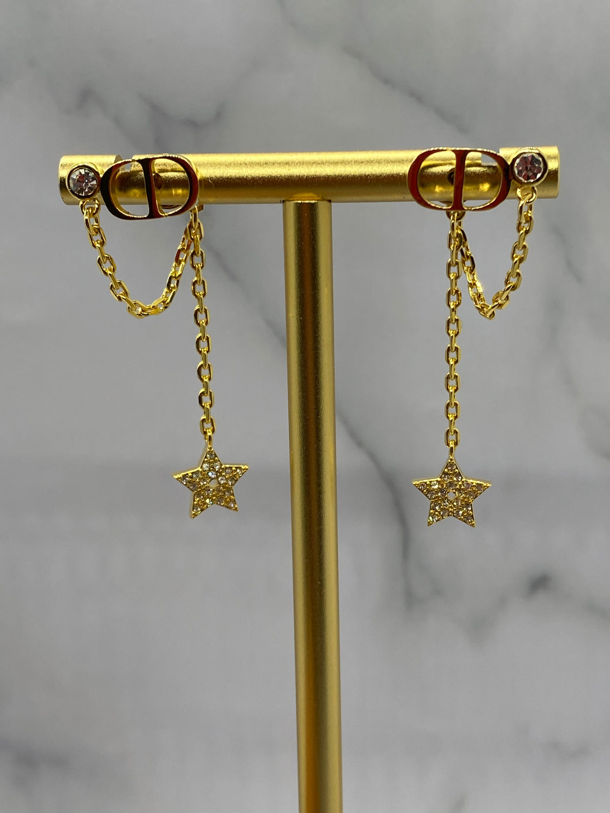 CHRISTIAN DIOR CD Gold Tone Star Pendant Earrings - Pre owned