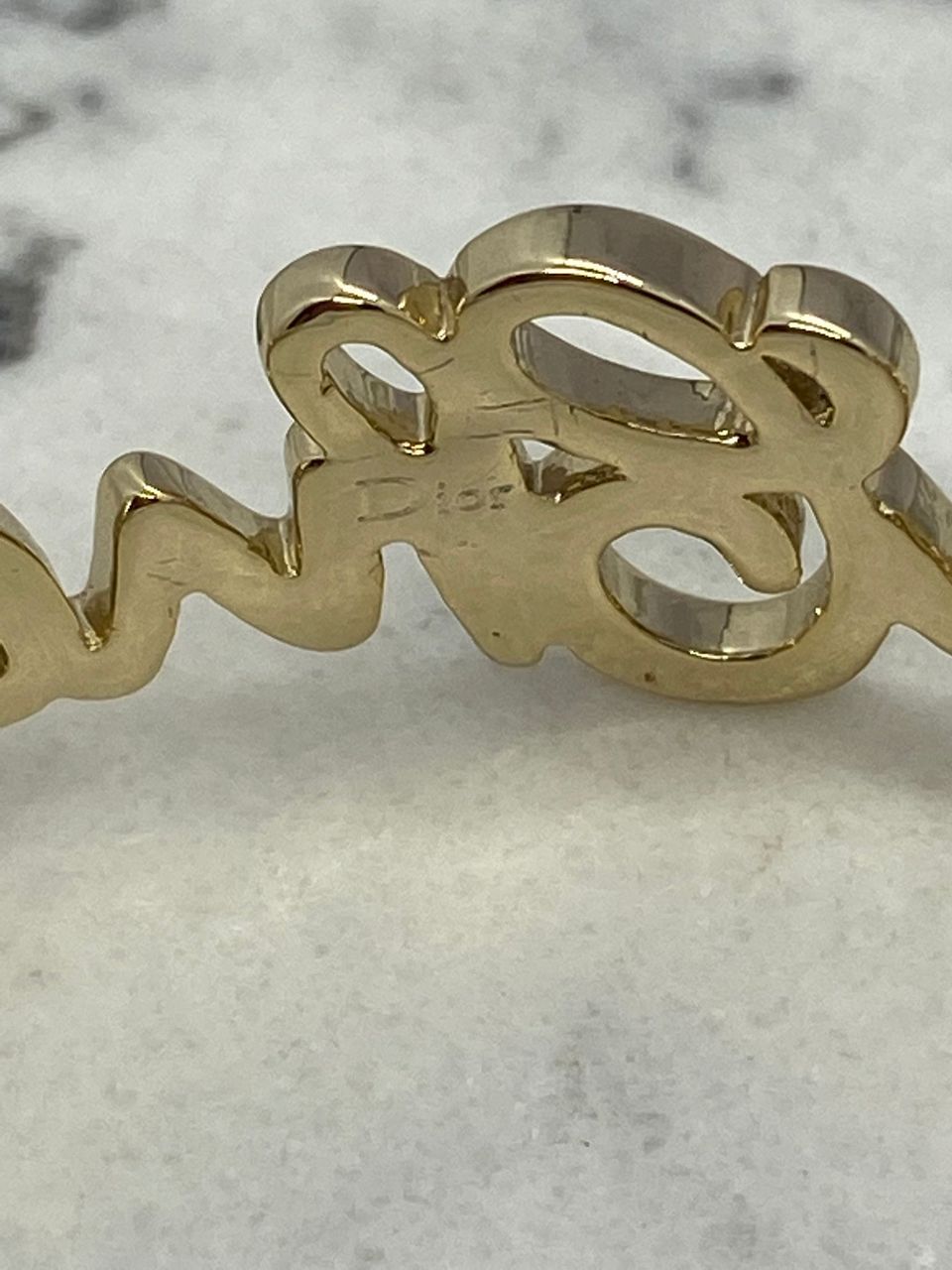CHRISTIAN DIOR Light Gold Script Cuff Bracelet - Pre owned